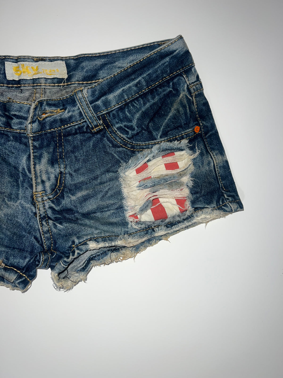 Distressed denim shorts