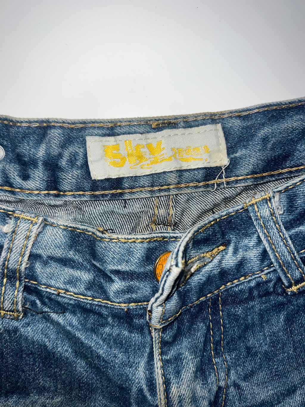 Distressed denim shorts